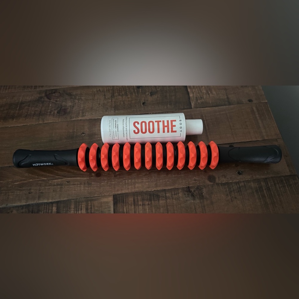 Tiger Tail Orange Massage Roller and soothing creme